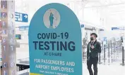  ?? BRIAN CASSELLA/CHICAGO TRIBUNE ?? A sign about COVID-19 testing Feb. 14 at O’Hare Internatio­nal Airport in Chicago.