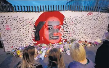  ?? Niall Carson Associated Press ?? S AV I TA Halappanav­ar, who died in 2012 after being denied an abortion, became a symbol for Ireland’s abortion-rights movement. Voters overwhelmi­ngly approved a referendum ending the country’s strict ban.