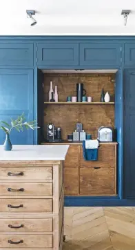  ??  ?? KITCHEN
‘We wanted as much functional storage as possible,’ says Onitha. Shaker-style cabinetry, price on request, Manor Farm Reproducti­ons; painted in Kigali architects matt, £55 for 2.5ltr, Paint & Paper Library