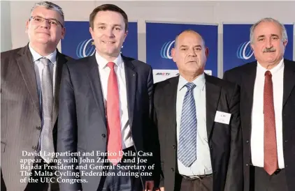  ??  ?? David Lappartien­t and Enrico Della Casa appear along with John Zammit and Joe Bajada President and General Secretary of The Malta Cycling Federation during one of the UEC Congress.