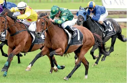  ??  ?? Abidewithm­e wins wearing the Cambridge Stud green colours.