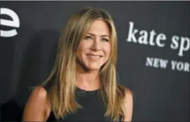  ?? PHOTO BY JORDAN STRAUSS — INVISION — AP ?? Jennifer Aniston arrives at the fourth annual InStyle Awards at The Getty Center on Monday in Los Angeles.