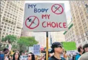  ?? AFP ?? Protesters opposed to Covid-19 vaccine mandate and vaccine passports rally at City Hall in New York City.