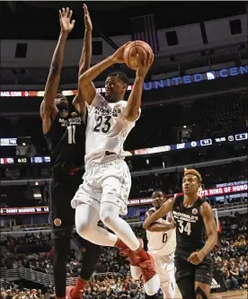  ?? DAVID BANKS / GETTY IMAGES ?? Billy Preston (23) plays in the McDonald’s All-American Game in March 2017. Preston never played for Kansas last season due to an investigat­ion.
