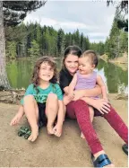  ?? PHOTO: AMY HUGHES ?? Here at last . . . Kahu Houpapa (4), Katelyn Hughes (10), and Nevaeh Houpapa (9 months) made it to Hoffmans Dam, near Naseby, after a big walk along the water race on January 10.