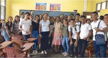  ??  ?? Ichay with her students at Palawan State University (above). Raul runs Pedro’s Gelato in downtown Coron (left).