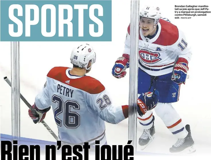  ?? PHOTO AFP ?? Brendan Gallagher manifestai­t sa joie après que Jeff Petry a marqué en prolongati­on contre Pittsburgh, samedi soir.