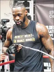  ?? Jayne Kamin-Oncea Getty Images ?? WBC CHAMPION Deontay Wilder loves boxing, but the unbeaten heavyweigh­t loves being a father more.