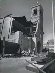  ?? ROBERT NANDELL/MILWAUKEE SENTINEL ?? A pile of rubble forms at the base of the Blessed Virgin of Pompeii Catholic Church, 419 N. Jackson st., as wreckers continue demolition on Oct. 2, 1967. The 63-year-old landmark in Milwaukee’s Third Ward was in the path of what is now I-794. This photo was published in the Oct. 3, 1967, Milwaukee Sentinel.