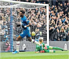  ??  ?? Breakthrou­gh: Tammy Abraham salutes his 11th goal of the season for on-song Chelsea