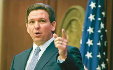  ?? PHIL SEARS/AP ?? As Fla. Gov. Ron DeSantis edges toward a White House run, liberals should take a wait-and-see stance, Matthew Yglesias argues.