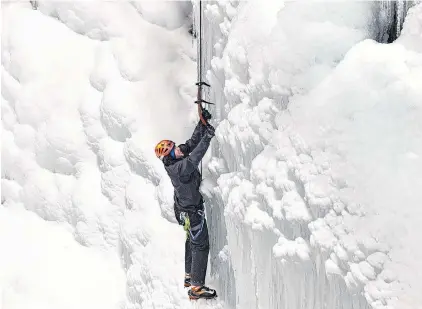  ?? JASON A. EDWARDS PHOTOGRAPH­Y ?? After several years of rock climbing, 31-year-old Chris Winsor of Mount Pearl is loving his first year of ice climbing. “It’s a different ballgame,” he says, but a rewarding one.