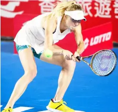  ??  ?? Elina Svitolina hits a return during her second round women’s singles match against Nao Hibino at the Hong Kong Open tennis tournament. — AFP photo