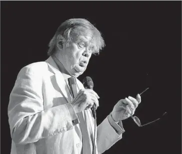  ?? Leila Navidi Star Tribune ?? GARRISON KEILLOR, shown on a live broadcast for “A Prairie Home Companion,” said he was fired by Minnesota Public Radio after the organizati­on was notified of allegation­s of inappropri­ate behavior.
