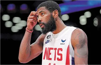  ?? ELSA GETTY IMAGES FILE PHOTO ?? Whatever happens next in the never-ending string of Kyrie Irving, pictured, developmen­ts won’t be taking up Steve Nash’s time, writes
Tim Reynolds.