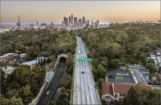  ?? Robert Gauthier Los Angeles Times ?? THE 110 FREEWAY toward downtown in April amid early coronaviru­s restrictio­ns. “L.A. was always kind of set up for disaster,” said one expert. “All of us last year, we were kind of waiting.”