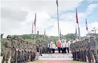  ??  ?? LOCAL officials led by Mayor Gonzales-Kwan during the commemorat­ion of Suluan Raid in Guiuan.