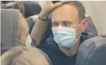  ?? MSTYSLAV CHERNOV/AP ?? Alexei Navalny and his wife Yulia sit on the plane Sunday in Germany on their flight to Moscow.