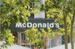  ?? MICHEL SPINGLER/AP ?? Fast-food giant McDonald’s has agreed to settle a long-running tax dispute in France. Above, a McDonald’s in the northern French town of Lille.