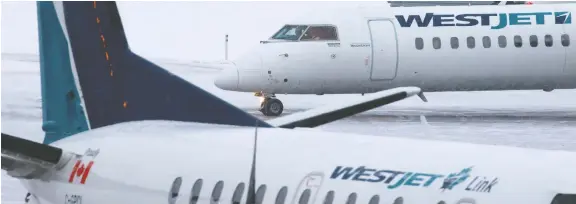  ?? GAVIN YOUNG FILES ?? Westjet planes will only cross the border to operate rescue and repatriati­on flights in partnershi­p with the feds after Sunday as COVID-19 creates tightened borders.