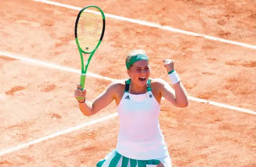  ??  ?? Latvia's Jelena Ostapenko celebrates after winning her semifinal tennis match against Switzerlan­d's Timea Bacsinszky at the Roland Garros 2017 French Open on Thursday in Paris. (AFP)