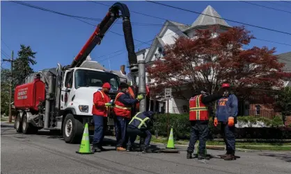  ?? Photograph: Desiree Rios/The Guardian ?? The public works department’s emergency sewer division performs preventive maintenanc­e on a sewage line in north Mount Vernon, New York, in 2021.