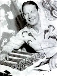  ?? Courtesy photo ?? Leon McAuliffe and his four-necked steel guitar in the 1950s. McAuliffe of Rogers, one of the best and most famous steel guitarists in the world, played for a while with Bob Wills and the Texas Playboys.