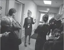  ?? DAX MELMER ?? Patricia Thomas leads a tour of Hotel-Dieu Grace Healthcare’s new Crisis and Mental Wellness Centre in downtown Windsor on Friday.