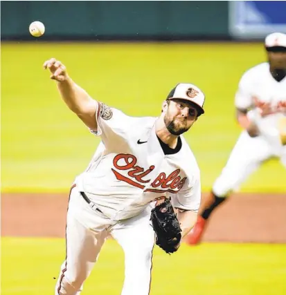 ?? JULIA NIKHINSON/AP PHOTOS ?? Orioles starting pitcher Jordan Lyles allowed one run on six hits and struck out six in six innings in Baltimore’s 9-5 win over the visiting Red Sox on Sunday.