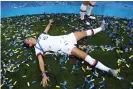  ??  ?? Alex Morgan celebrates after winning her second World Cup in France last year. Photograph: Catherine Ivill/Fifa/Getty Images