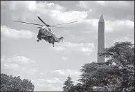  ?? The New York Times/AL DRAGO ?? Marine One takes off from the White House on June 9 as President Donald Trump leaves Washington for a weekend at his golf resort in New Jersey.