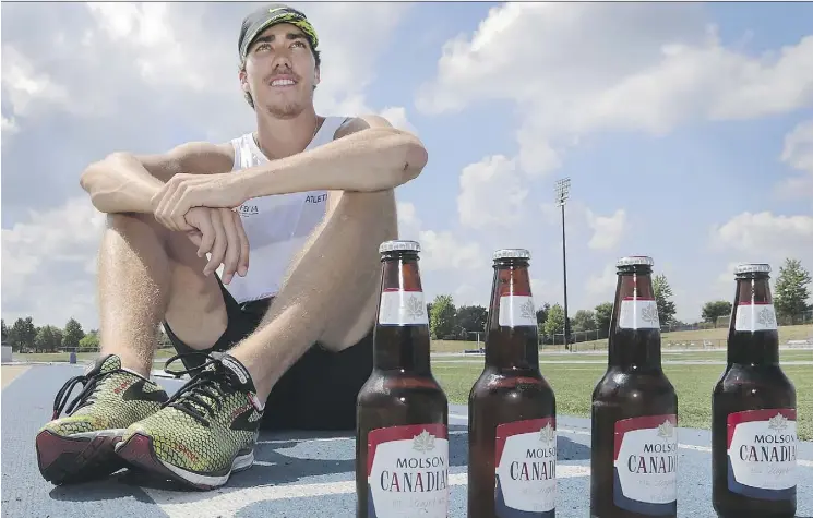  ?? DAN JANISSE ?? Current beer mile world record-holder Corey Bellemore says competing in the unusual race is something he does simply for enjoyment and to forget about the stress of everyday life for a while. The 22-year-old University of Windsor track star recently...