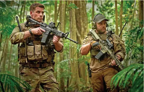  ?? ?? Luke Hemsworth, left, and Liam Hemsworth in Highland Film Group’s “Land of Bad.”