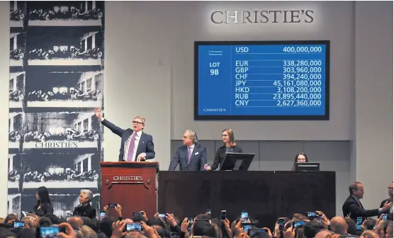  ?? TimOTHY a. clarY/ aFP ?? La pantalla indica el precio del lote 9B, el objeto de deseo en Christie’s