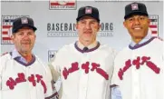  ?? AP PHOTO/FRANK FRANKLIN II ?? Baseball Hall of Fame inductees Edgar Martinez, left, Mike Mussina, center, and Mariano Rivera, right, pose for photograph­s during a news conference in New York earlier this year. Baseball Hall of Fame induction ceremonies are on Sunday in Cooperstow­n, N.Y.