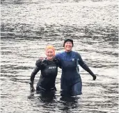  ??  ?? Swimming buddies Hilary and Beth on an open water swim prior to the pandemic