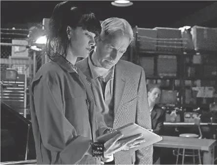  ?? SONJA FLEMMING/CBS ?? Abby (Pauley Perrette) and her boss, Gibbs (Mark Harmon), are two of the remaining original cast members of “NCIS.”