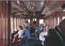  ?? NEW MEXICAN FILE PHOTO ?? Passengers enjoy a ride on the Cumbres and Toltec Scenic Railroad in 2019. The train will be having rides again into October.