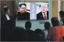  ?? AP ?? TV news at Seoul railway station heralds the ‘Negotiatio­ns of the Century’ between Kim Jong-un and Donald Trump