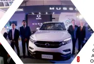  ??  ?? 8 8. Ssangyong officials unveil the Musso pickup truck