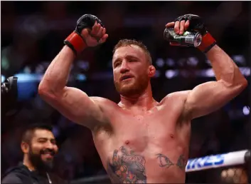  ?? ?? Justin Gaethje celebrates after his decision victory over Michael Chandler in their lightweigh­t bout during the UFC 268event at Madison Square Garden in 2021.