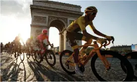  ??  ?? Egan Bernal wearing the overall leader’s yellow jersey, in action in front of the Arc de Triomphe last year at the conclusion to the Tour de France. Photograph: Gonzalo Fuentes/ Reuters