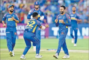  ?? BCCI ?? Shreyas Gopal (right) claimed figures of 4/16 to bowl Rajasthan Royals to a 30run win over Royal Challenger­s Bangalore on Saturday.