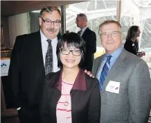  ??  ?? From left, Boyden’s Kevin Gregor, Trico Foundation’s Eleanor Chiu and TransAlta’s Hunter Wight.