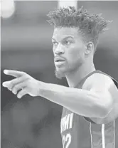  ?? NICK WASS/AP ?? Jimmy Butler was featured in a commercial with the NBA’s new beer partner, Michelob, that debuts Friday.