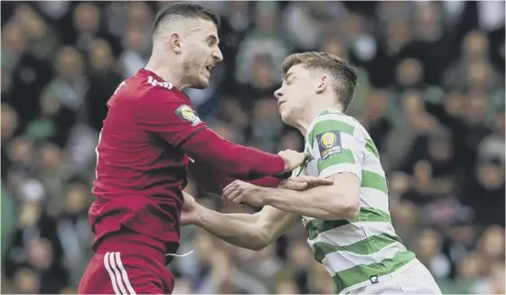  ??  ?? 2 Ryan Christie clashes with Aberdeen’s Dominic Ball in the Scottish Cup semifinal. The midfielder has no recollecti­on of the incident which left him with a broken cheekbone, and fractures to his eye socket and jaw.