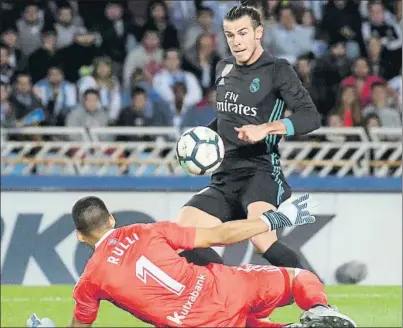  ?? FOTO: EFE ?? Así pico Bale ante Rulli para sentenciar