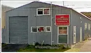  ?? JARED NICOLL/ FAIRFAX NZ ?? Crash pad or party central: there’s plenty of seating, and a wood fire, in the former work site in Waiu St, Wainuiomat­a. The owners reckon it’s just what British and Irish Lions fans might want.