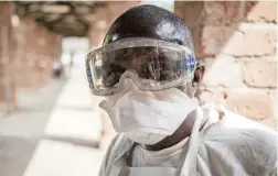  ?? PICTURE: AP/AFRICAN NEWS AGENCY (ANA) ?? OUTBREAK: A health worker wears protective clothing outside an isolation ward to diagnose and treat suspected Ebola patients, at Bikoro Hospital. Congo’s latest Ebola outbreak has now spread to Mbandaka, a city of more than 1 million people.