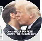  ??  ?? COMMANDER IN CHEEK Greeting French counterpar­t